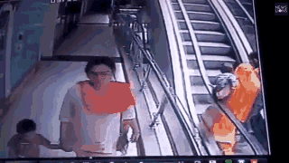 The baby slipped from her arms and hit the railing of the escalator before falling down.A 10-month-old girl died after accidentally falling from her mother
